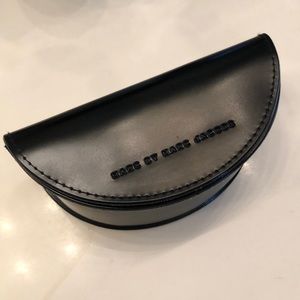 Marc by a Marc Jacobs sunglass case.